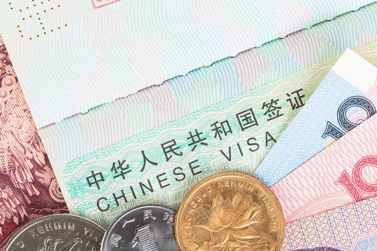 China extends reduction in visa fees